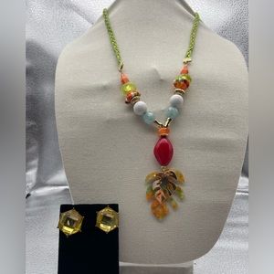 Lot of 2 pieces of costume jewelry. Earrings and necklace set.